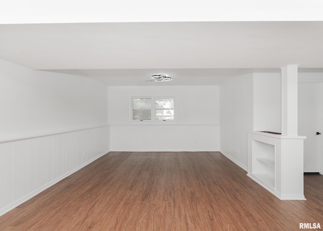 3503 36th St, Moline, IL 61265 - empty room featuring wood finished floors and wainscoting