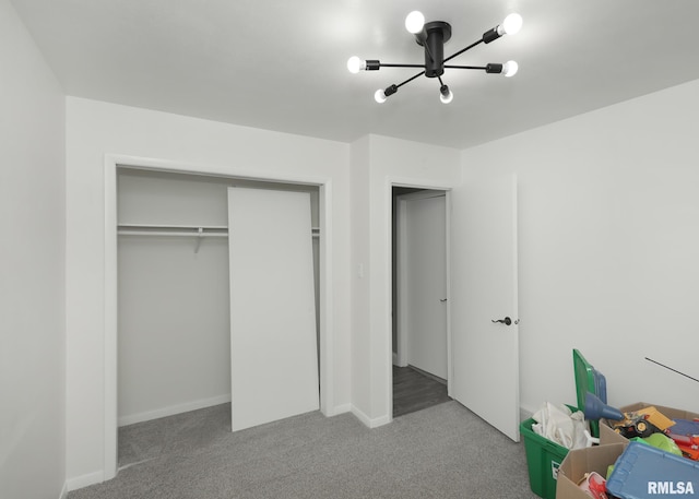 3503 36th St, Moline, IL 61265 - bedroom featuring a chandelier and carpet