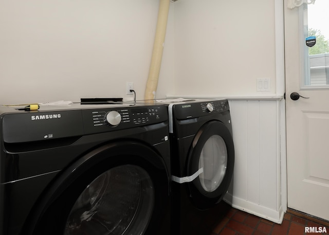 3503 36th St, Moline, IL 61265 - laundry room featuring brick flooring and washer and dryer