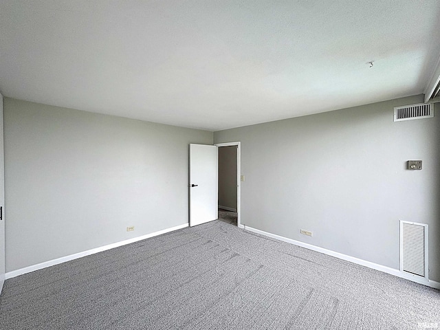 1800 7th St Unit 6D, East Moline, IL 61244 - carpeted spare room featuring baseboards