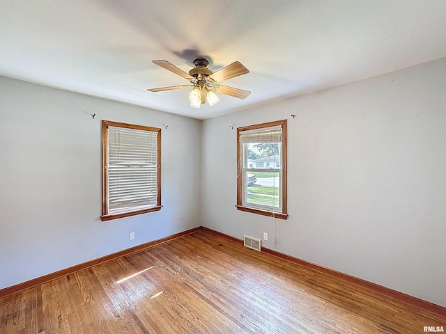 409 E Pearl St, Geneseo, IL 61254 - spare room with light wood-style floors and ceiling fan