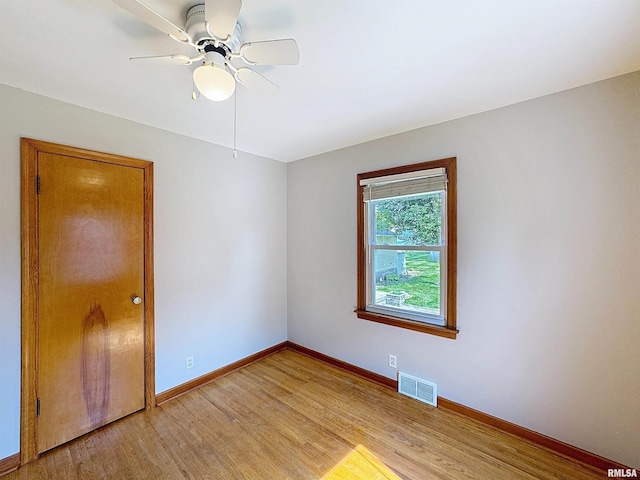 409 E Pearl St, Geneseo, IL 61254 - empty room with light wood-style floors and a ceiling fan