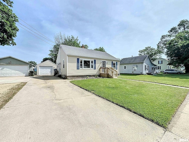 409 E Pearl St, Geneseo, IL 61254 - view of front facade featuring a detached garage, a front lawn, an outbuilding, and a chimney