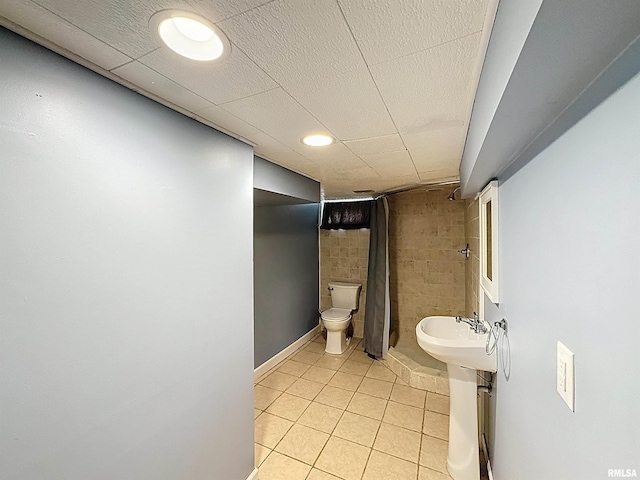 409 E Pearl St, Geneseo, IL 61254 - bathroom with tile patterned flooring and curtained shower