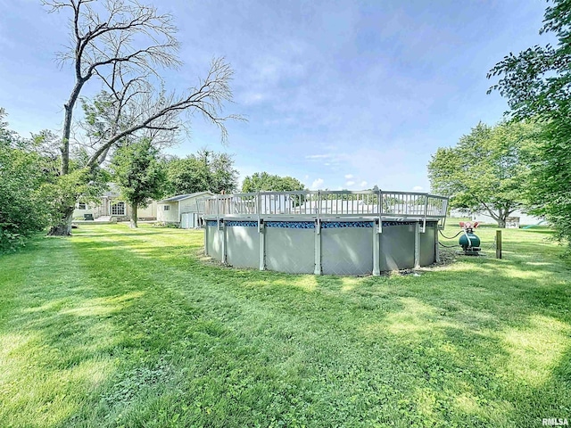 409 E Pearl St, Geneseo, IL 61254 - swimming pool featuring a lawn
