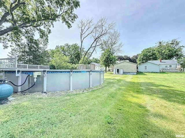 409 E Pearl St, Geneseo, IL 61254 - view of green lawn featuring an outdoor pool
