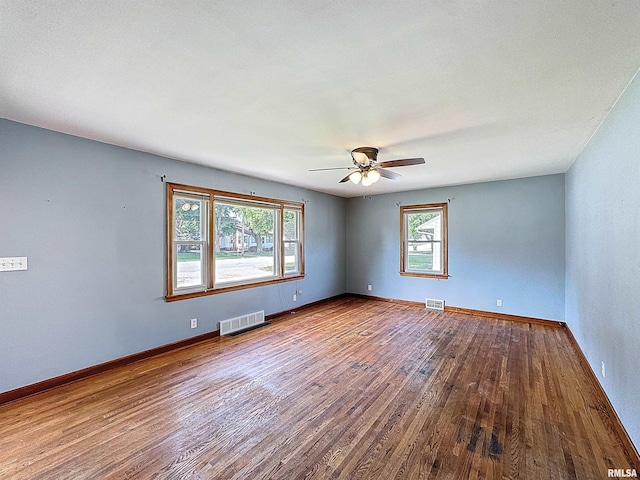 409 E Pearl St, Geneseo, IL 61254 - empty room featuring wood finished floors and ceiling fan