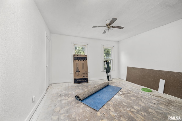 1312 Farnam St, Davenport, IA 52803 - exercise area with ceiling fan and baseboards