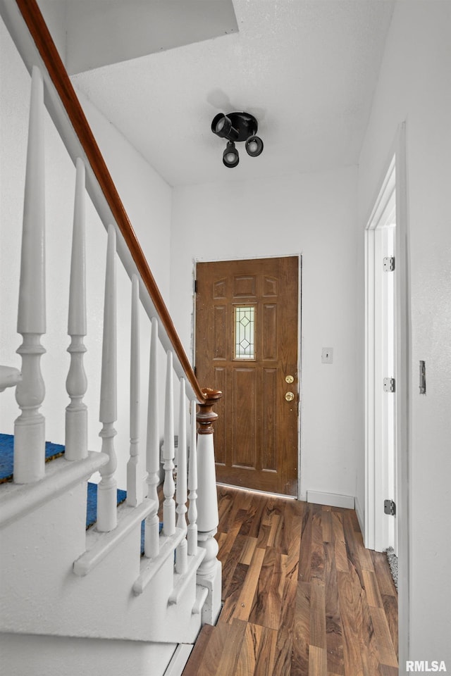 1312 Farnam St, Davenport, IA 52803 - entryway featuring wood finished floors and stairway
