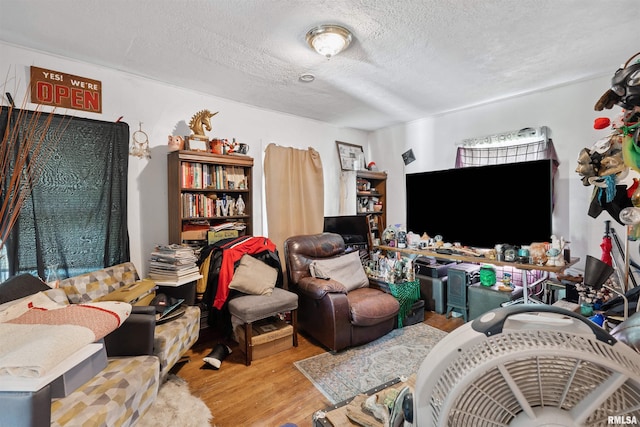 1520 10th Ave, Moline, IL 61265 - living room with wood finished floors and a textured ceiling