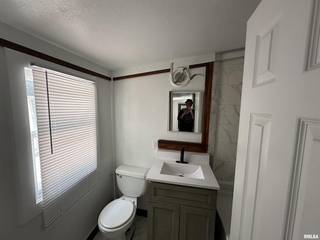 1415 45th Ave, Rock Island, IL 61201 - bathroom featuring vanity and a textured ceiling