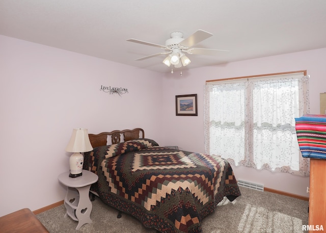 2035 N Gayman Ave, Davenport, IA 52804 - bedroom featuring carpet floors and a ceiling fan
