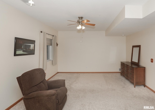 2035 N Gayman Ave, Davenport, IA 52804 - living area with a ceiling fan and light colored carpet