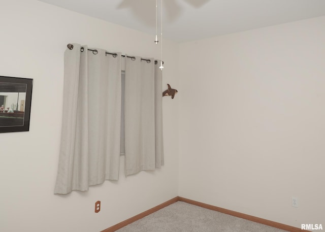 2035 N Gayman Ave, Davenport, IA 52804 - unfurnished room featuring carpet and baseboards