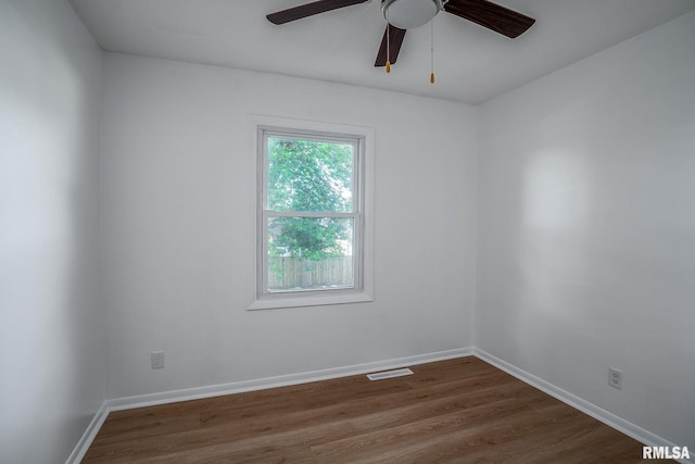 1811 Valley Dr, Davenport, IA 52806 - empty room with ceiling fan and dark wood finished floors