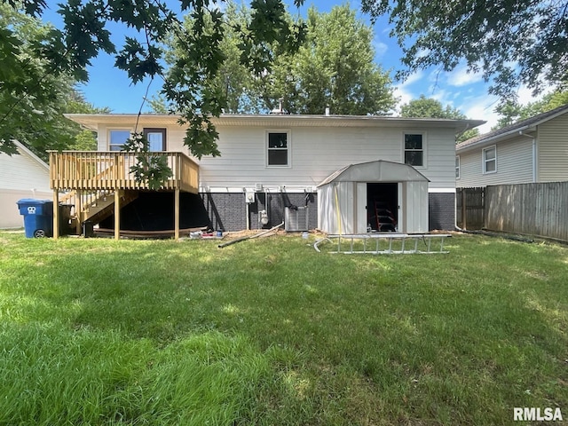 1811 Valley Dr, Davenport, IA 52806 - back of property with a shed, a deck, stairs, and brick siding
