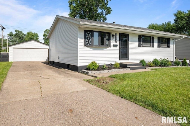3307 Clover Hills Dr, Bettendorf, IA 52722 - view of front of home with a detached garage, a front yard, and an outdoor structure