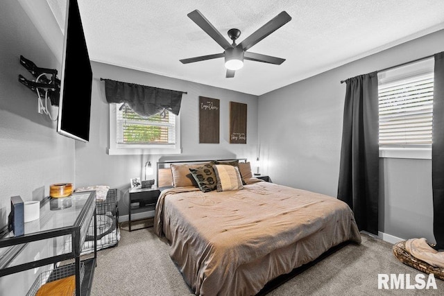 3307 Clover Hills Dr, Bettendorf, IA 52722 - bedroom featuring a textured ceiling and ceiling fan