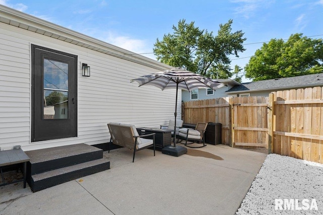 3307 Clover Hills Dr, Bettendorf, IA 52722 - view of patio / terrace featuring an outdoor hangout area, entry steps, and a gate