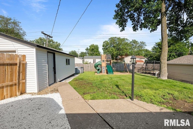 3307 Clover Hills Dr, Bettendorf, IA 52722 - view of yard with a playground