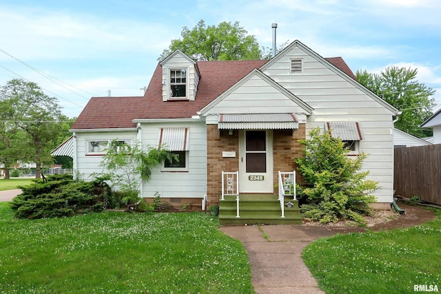 2348 24 1/2 St, Rock Island, IL 61201 - view of front of home with a shingled roof