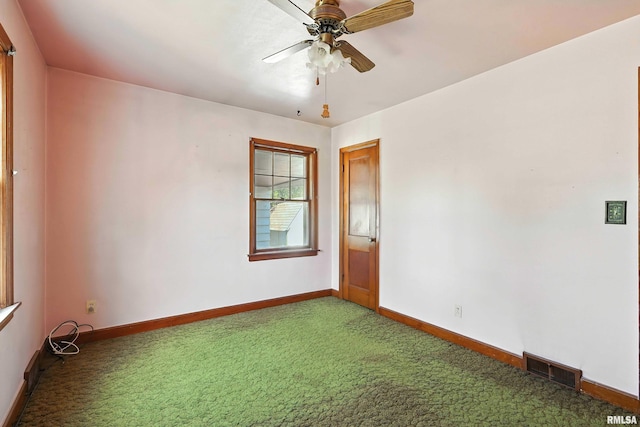 2348 24 1/2 St, Rock Island, IL 61201 - empty room with carpet flooring and a ceiling fan