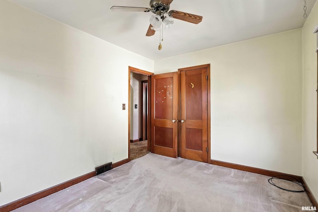 2348 24 1/2 St, Rock Island, IL 61201 - empty room featuring light carpet and a ceiling fan