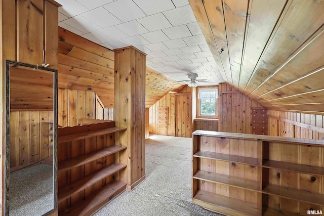 2348 24 1/2 St, Rock Island, IL 61201 - bonus room featuring carpet floors, wooden walls, vaulted ceiling, and ceiling fan