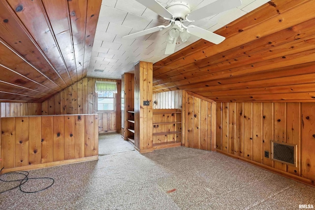 2348 24 1/2 St, Rock Island, IL 61201 - bonus room featuring wooden walls, lofted ceiling, a ceiling fan, and carpet floors