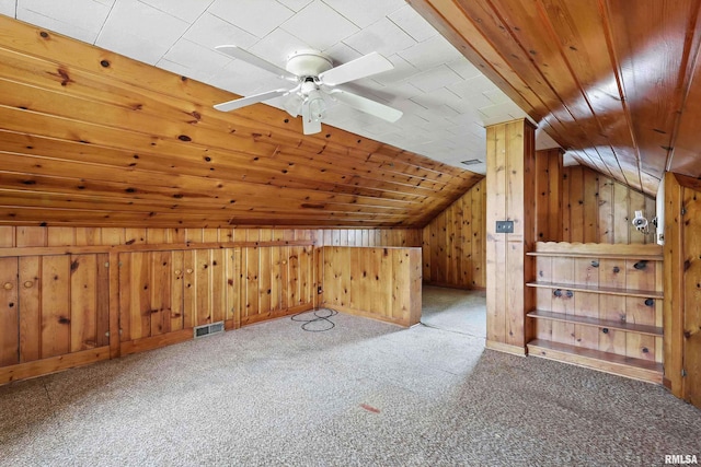 2348 24 1/2 St, Rock Island, IL 61201 - bonus room with carpet flooring, lofted ceiling, wooden walls, and ceiling fan