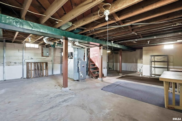 2348 24 1/2 St, Rock Island, IL 61201 - unfinished basement with electric panel, stairs, and heating unit