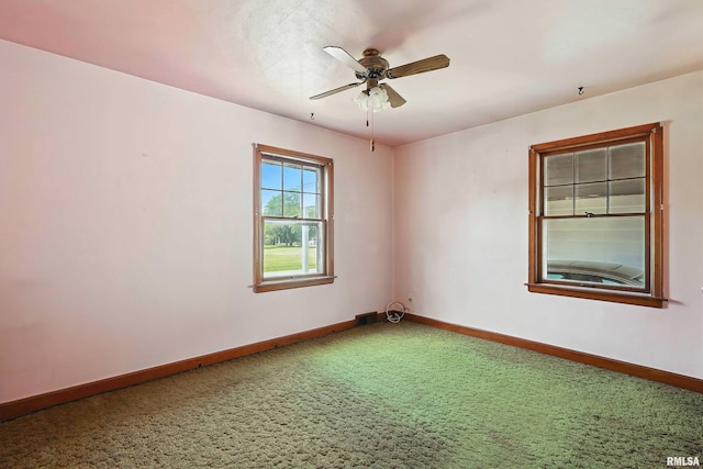 2348 24 1/2 St, Rock Island, IL 61201 - spare room with carpet and a ceiling fan