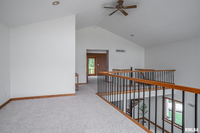 4460 160th St, Clinton, IA 52732 - corridor with lofted ceiling, carpet floors, and an upstairs landing