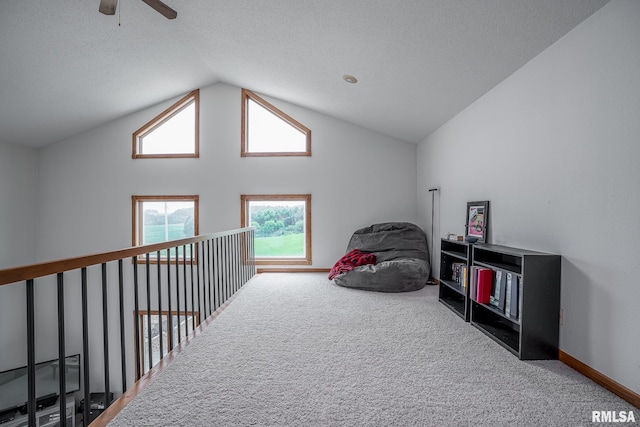 4460 160th St, Clinton, IA 52732 - playroom featuring carpet floors, vaulted ceiling, and a ceiling fan