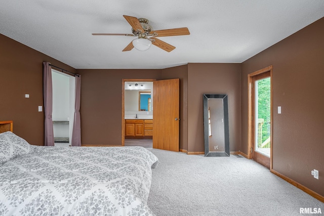 4460 160th St, Clinton, IA 52732 - bedroom featuring access to exterior, carpet flooring, ceiling fan, and connected bathroom