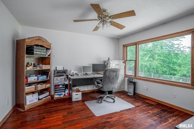 4460 160th St, Clinton, IA 52732 - office space with wood finished floors, a ceiling fan, and a textured ceiling