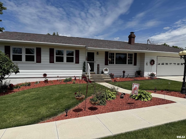 101 E 6th St, Sherrard, IL 61281 - single story home featuring an attached garage, a front lawn, a chimney, and driveway