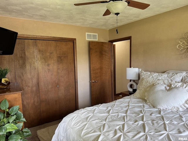 101 E 6th St, Sherrard, IL 61281 - carpeted bedroom featuring a closet and a ceiling fan