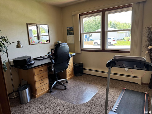 101 E 6th St, Sherrard, IL 61281 - carpeted home office featuring a baseboard heating unit