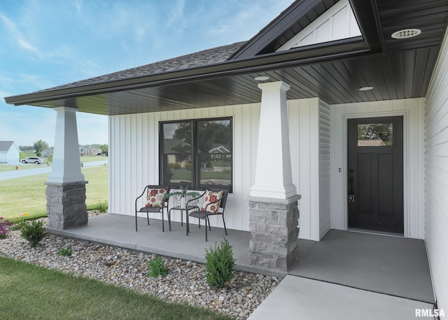624 Rock Point Rd, Colona, IL 61241 - entrance to property with covered porch and a shingled roof