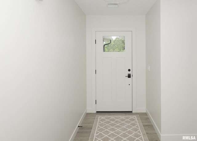 624 Rock Point Rd, Colona, IL 61241 - entryway with light wood-style flooring and baseboards