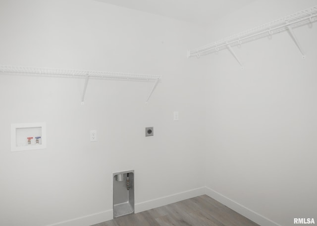 624 Rock Point Rd, Colona, IL 61241 - laundry room featuring hookup for an electric dryer, washer hookup, and wood finished floors