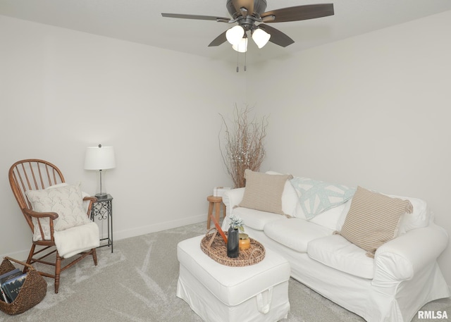 624 Rock Point Rd, Colona, IL 61241 - carpeted living area featuring ceiling fan and baseboards