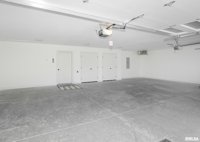 624 Rock Point Rd, Colona, IL 61241 - garage with electric panel and a garage door opener