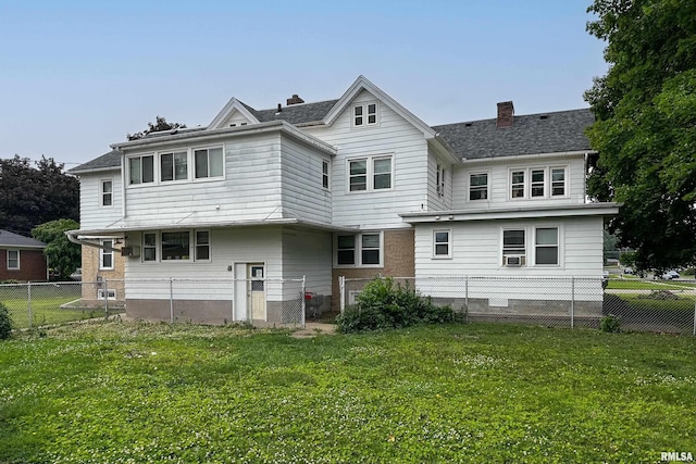 905 S 5th Ave, Clinton, IA 52732 - back of house with a fenced backyard and a chimney