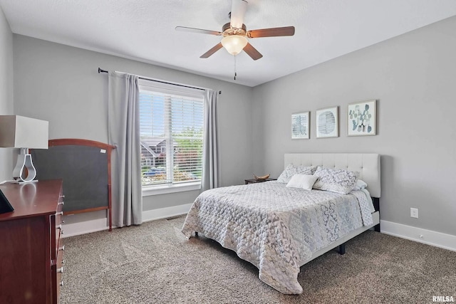 6250 Whispering Hill Ct, Bettendorf, IA 52722 - carpeted bedroom with baseboards and a ceiling fan