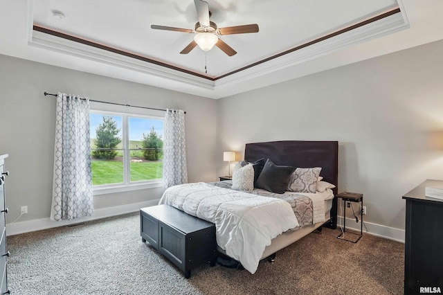 6250 Whispering Hill Ct, Bettendorf, IA 52722 - carpeted bedroom with a raised ceiling, crown molding, and a ceiling fan