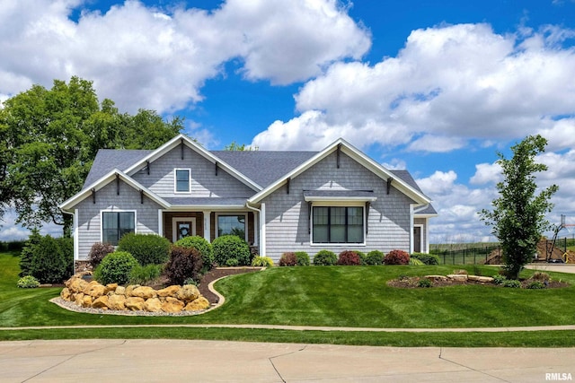 6250 Whispering Hill Ct, Bettendorf, IA 52722 - craftsman-style house with roof with shingles
