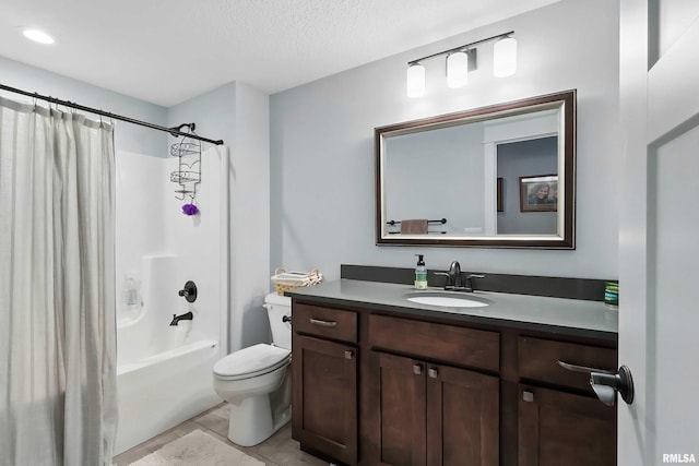 6250 Whispering Hill Ct, Bettendorf, IA 52722 - bathroom with vanity, shower / bath combo with shower curtain, and a textured ceiling