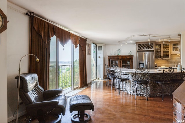 1800 7th St Unit 7A, East Moline, IL 61244 - sitting room with wood finished floors and bar